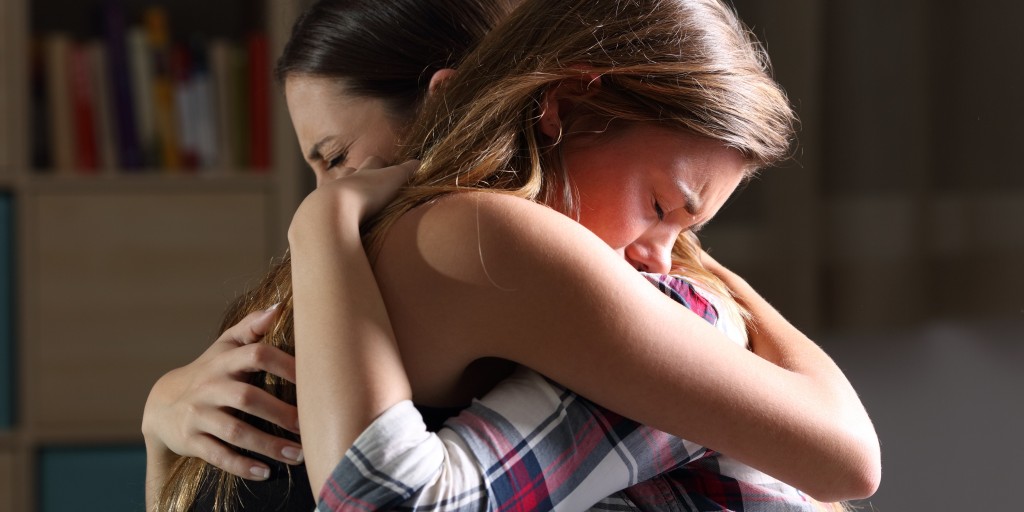 mother and daughter embracing due to forgiveness and recovery