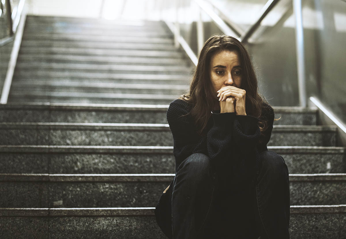 woman thinking about the stages of addiction